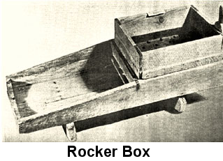 Black and white photo: Rough, unfinished, weathered rocker box.